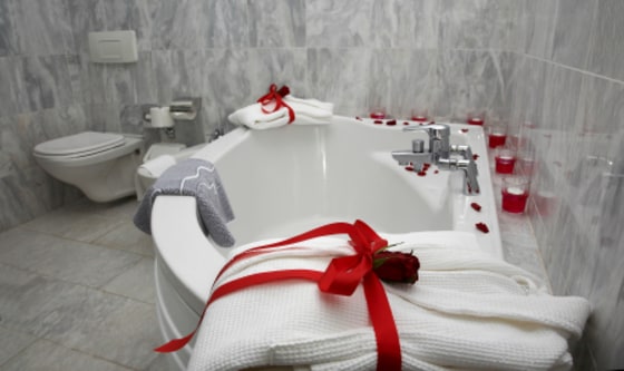 The best hotels excel at small but important details. At the Ritz Madrid in Spain, monogrammed robes are placed in a guest's room before arrival.